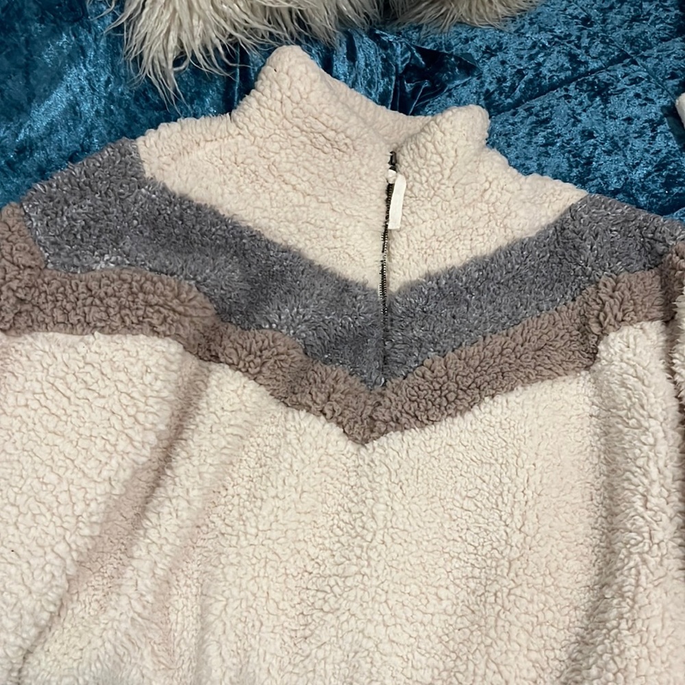 Warm fuzzy pull over jacket